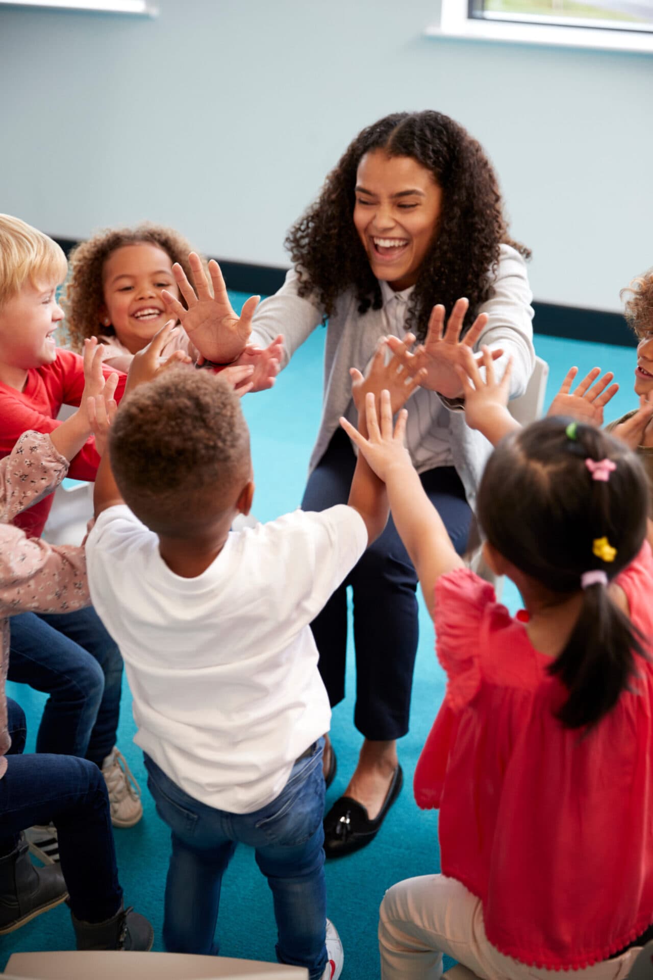 A Wee Discover teacher reading with children